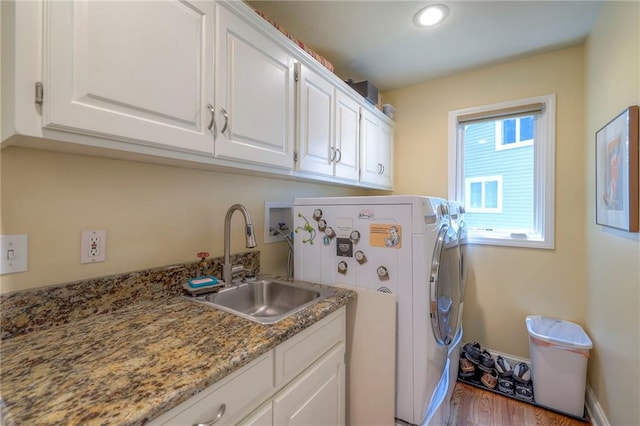 12409 Cambridge Cir, Leawood, KS 66209 - washroom featuring cabinet space, washing machine and clothes dryer, wood finished floors, and recessed lighting