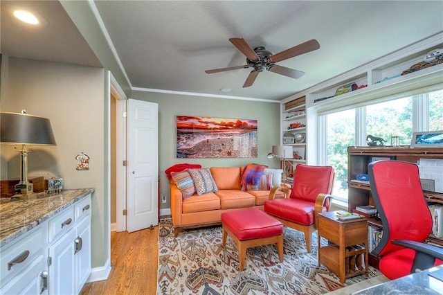 12409 Cambridge Cir, Leawood, KS 66209 - living room with light wood-style floors, a ceiling fan, ornamental molding, and recessed lighting