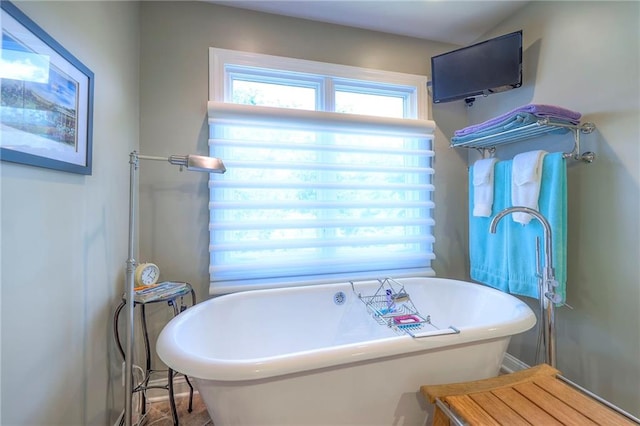 12409 Cambridge Cir, Leawood, KS 66209 - bathroom featuring a soaking tub