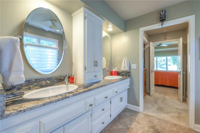 12409 Cambridge Cir, Leawood, KS 66209 - full bathroom with double vanity and connected bathroom