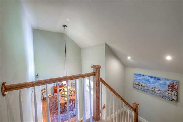 12409 Cambridge Cir, Leawood, KS 66209 - stairway with lofted ceiling and recessed lighting