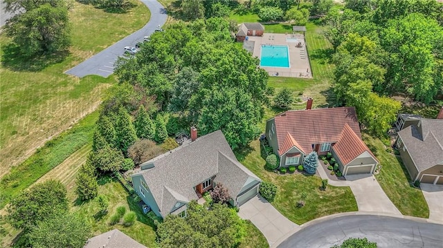 12409 Cambridge Cir, Leawood, KS 66209 - view from above of property featuring a pool area