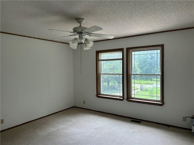 34908 E Shores Rd, Lone Jack, MO 64070 - spare room with a ceiling fan, light carpet, a textured ceiling, and ornamental molding