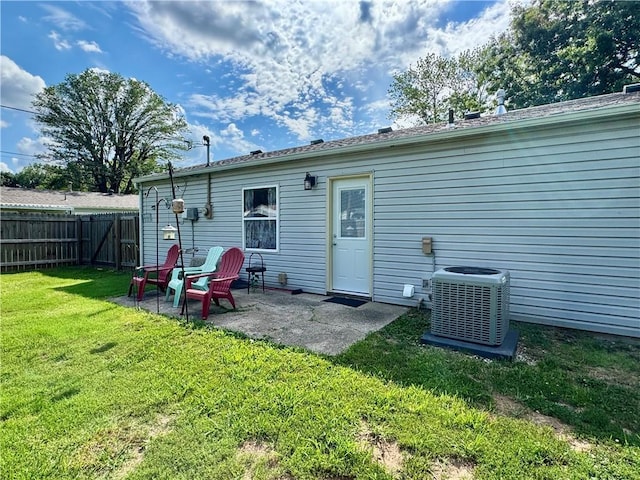 609 N 83rd Ter, Kansas City, KS 66112 - rear view of property with a patio