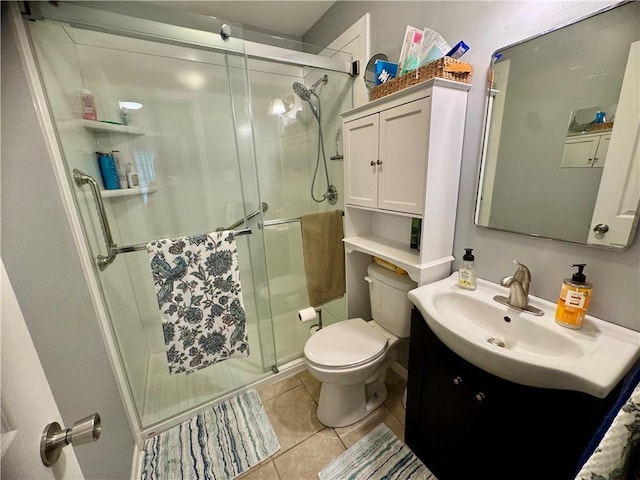 609 N 83rd Ter, Kansas City, KS 66112 - full bath with vanity, a stall shower, and tile patterned flooring
