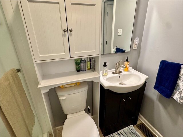 609 N 83rd Ter, Kansas City, KS 66112 - bathroom with vanity and toilet
