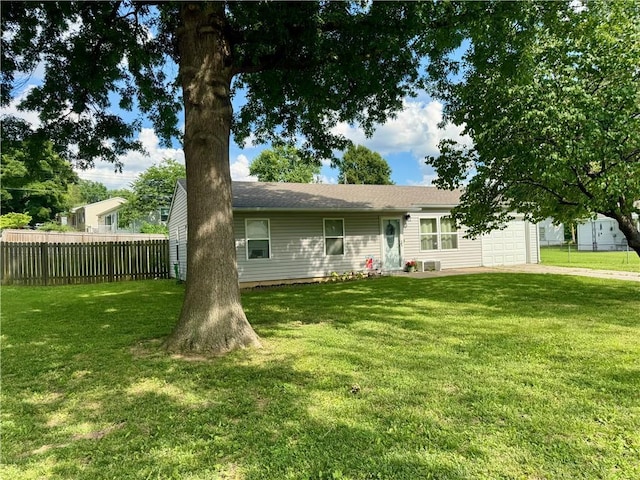 609 N 83rd Ter, Kansas City, KS 66112 - view of front of house with a garage and driveway