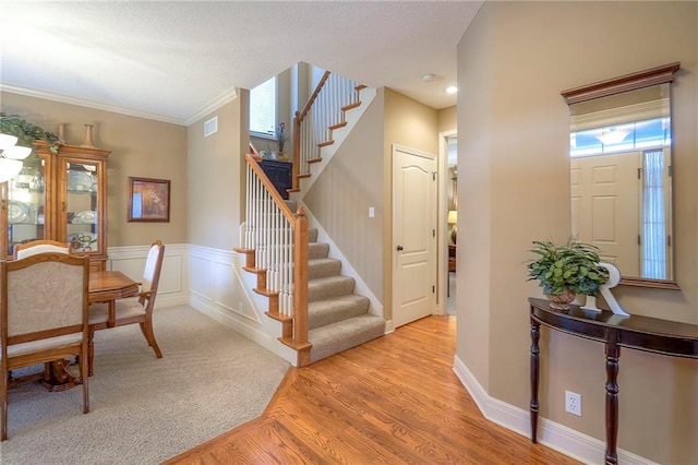 1105 Blazing Star Dr, Lees Summit, MO 64081 - entryway with stairway, ornamental molding, and light wood-type flooring