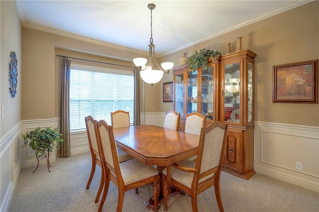 1105 Blazing Star Dr, Lees Summit, MO 64081 - dining space featuring wainscoting, light carpet, ornamental molding, a decorative wall, and a chandelier