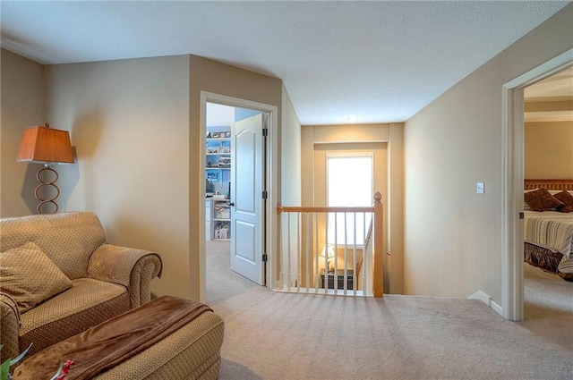 1105 Blazing Star Dr, Lees Summit, MO 64081 - living area with carpet and an upstairs landing