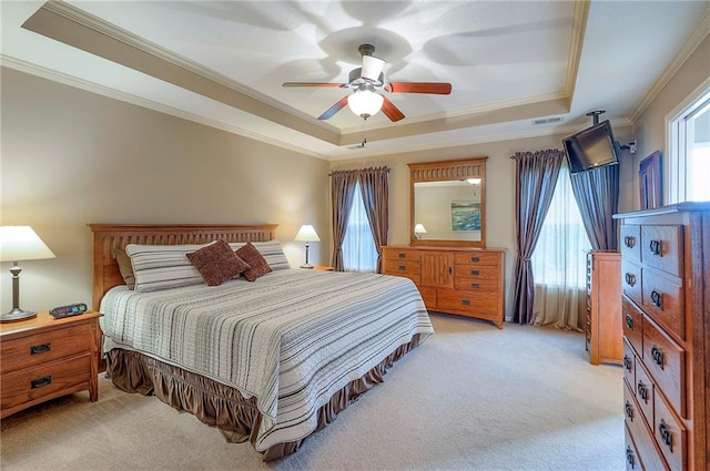 1105 Blazing Star Dr, Lees Summit, MO 64081 - bedroom featuring a raised ceiling, light carpet, ornamental molding, and ceiling fan