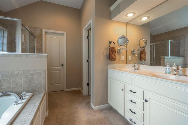 1105 Blazing Star Dr, Lees Summit, MO 64081 - bathroom featuring a stall shower, double vanity, and a garden tub