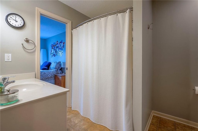 1105 Blazing Star Dr, Lees Summit, MO 64081 - bathroom with vanity, tile patterned flooring, and a shower with shower curtain