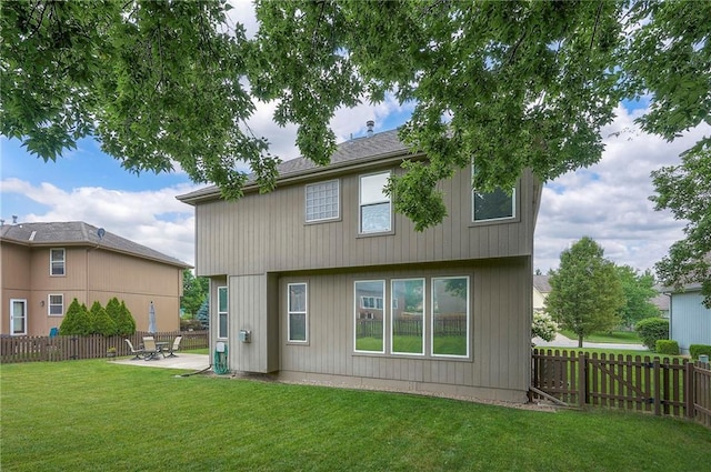 1105 Blazing Star Dr, Lees Summit, MO 64081 - rear view of house featuring a patio and a fenced backyard