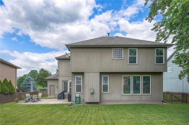 1105 Blazing Star Dr, Lees Summit, MO 64081 - rear view of property with a patio area, a fenced backyard, and a shingled roof