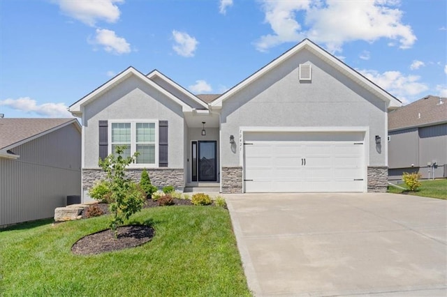 12421 Meadow Ln, Kansas City, KS 66109 - view of front facade with stone siding, driveway, a front lawn, and an attached garage