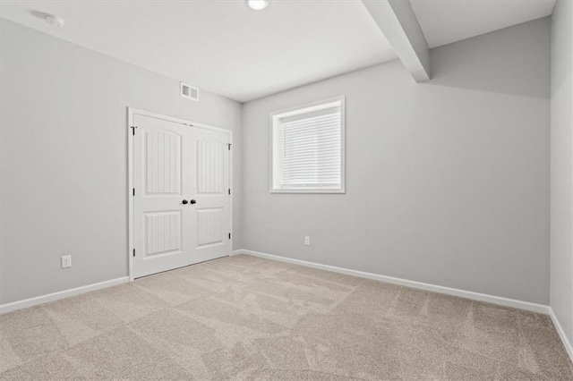 12421 Meadow Ln, Kansas City, KS 66109 - unfurnished bedroom with carpet flooring and a closet