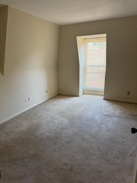 5737 Metcalf Ct, Overland Park, KS 66202 - spare room featuring carpet flooring and baseboards