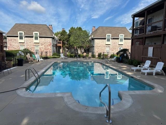 5737 Metcalf Ct, Overland Park, KS 66202 - community pool featuring a patio