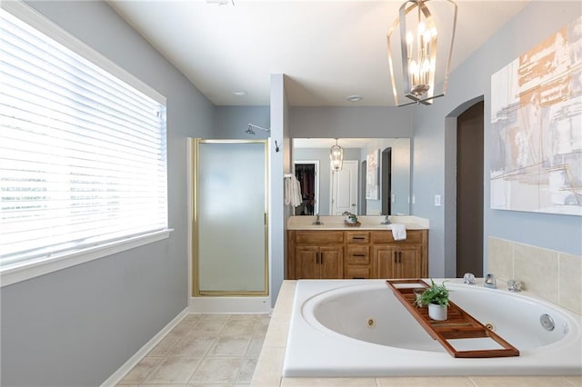 632 SW Shadow Glen Ct, Blue Springs, MO 64015 - bathroom with a stall shower, a jetted tub, double vanity, and a chandelier