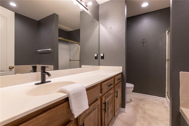 632 SW Shadow Glen Ct, Blue Springs, MO 64015 - full bathroom with vanity, a shower stall, recessed lighting, and a textured wall