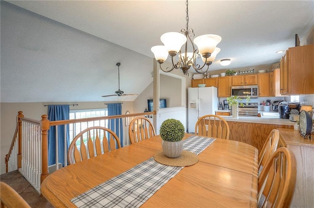 17470 S Walter St, Gardner, KS 66030 - dining area featuring ceiling fan, a chandelier, lofted ceiling, and a textured ceiling