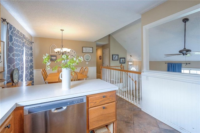 17470 S Walter St, Gardner, KS 66030 - kitchen with stainless steel dishwasher, light countertops, a ceiling fan, a chandelier, and pendant lighting