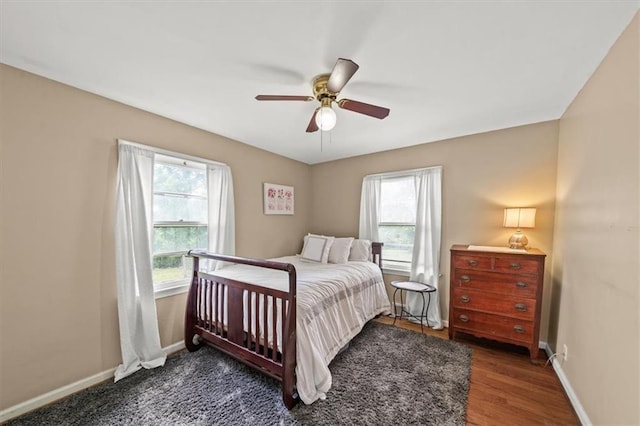 1115 W 26th St S, Independence, MO 64052 - bedroom featuring ceiling fan and wood finished floors
