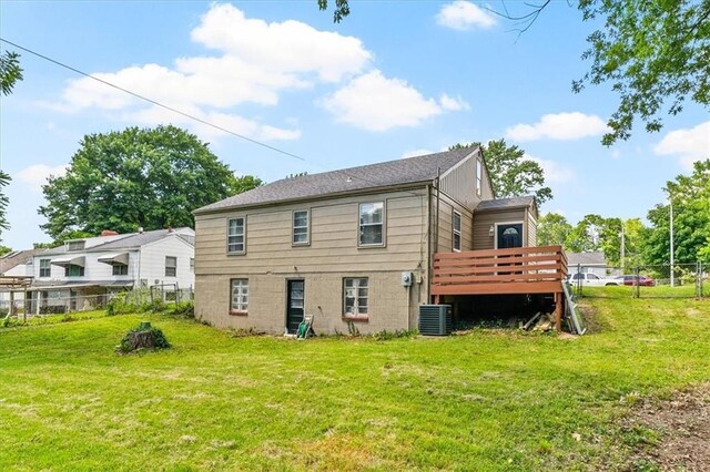 1115 W 26th St S, Independence, MO 64052 - back of property with a wooden deck and a fenced backyard