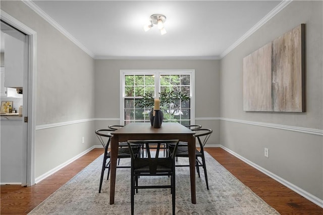 7710 Noland Rd, Lenexa, KS 66216 - dining area with wood finished floors and ornamental molding