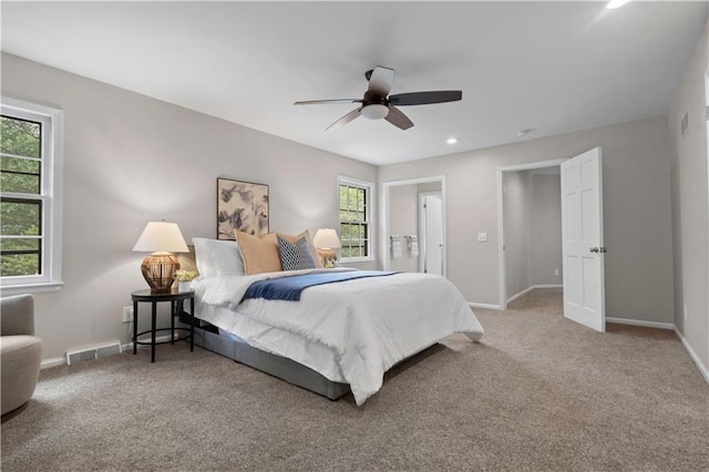 7710 Noland Rd, Lenexa, KS 66216 - carpeted bedroom featuring ceiling fan and recessed lighting