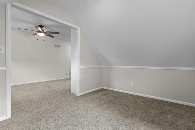 7710 Noland Rd, Lenexa, KS 66216 - additional living space featuring carpet flooring, vaulted ceiling, and ceiling fan