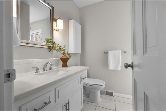 7710 Noland Rd, Lenexa, KS 66216 - bathroom featuring vanity and tile patterned flooring