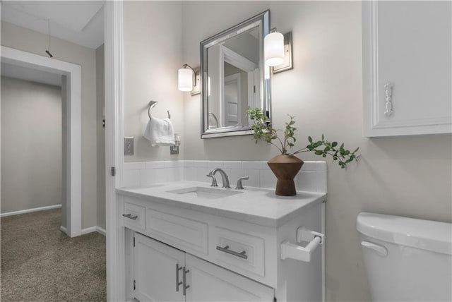7710 Noland Rd, Lenexa, KS 66216 - bathroom with vanity and toilet