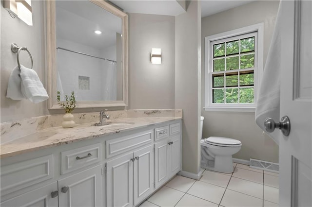 7710 Noland Rd, Lenexa, KS 66216 - full bath featuring vanity, tile patterned floors, and a shower with curtain