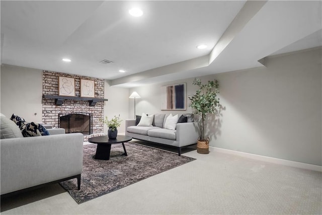 7710 Noland Rd, Lenexa, KS 66216 - carpeted living room featuring recessed lighting and a fireplace