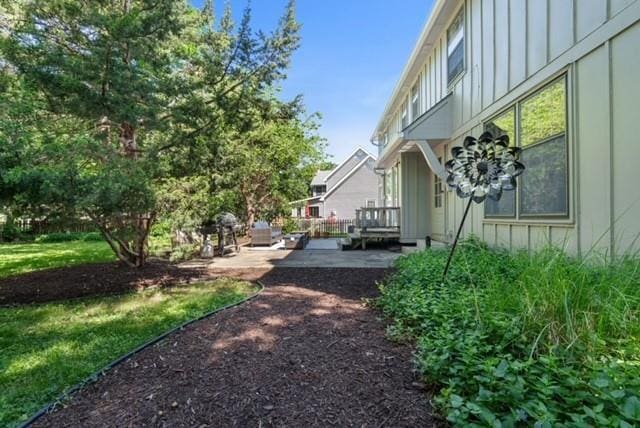 7710 Noland Rd, Lenexa, KS 66216 - view of yard with a patio