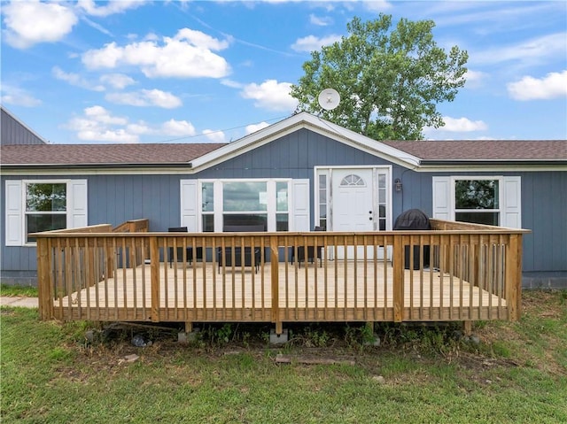 679 Kingman Rd, Pomona, KS 66076 - back of property with roof with shingles and a deck