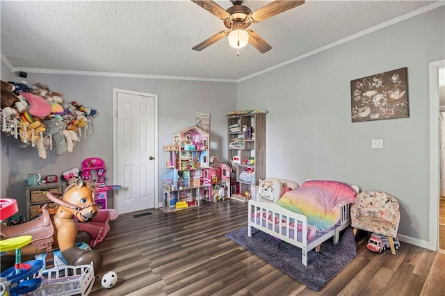 679 Kingman Rd, Pomona, KS 66076 - bedroom with wood finished floors, a textured ceiling, ornamental molding, and ceiling fan