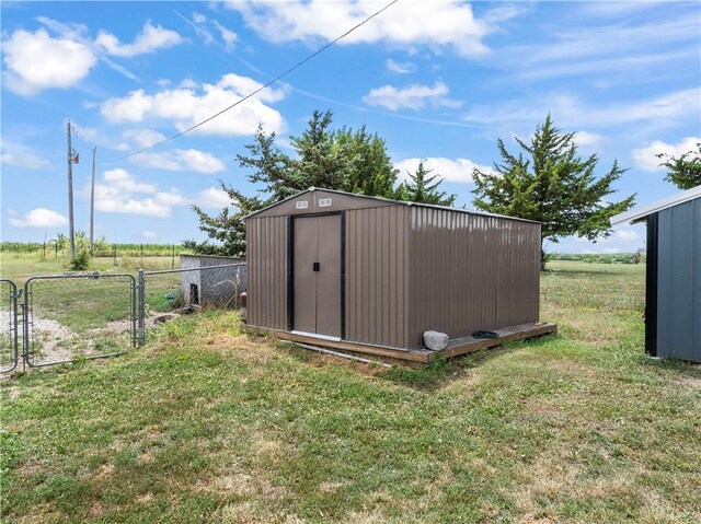 679 Kingman Rd, Pomona, KS 66076 - view of shed featuring a gate