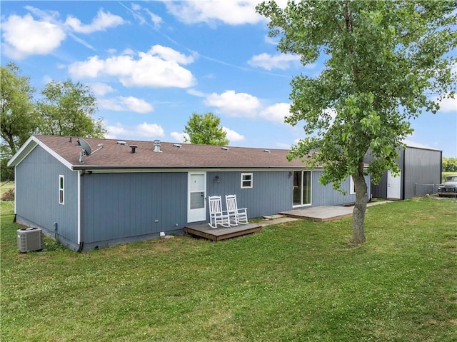 679 Kingman Rd, Pomona, KS 66076 - rear view of house featuring a deck, a yard, and a patio