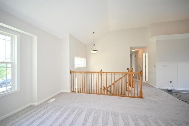 12905 Ridgeview Dr, Platte City, MO 64079 - carpeted spare room featuring healthy amount of natural light and lofted ceiling