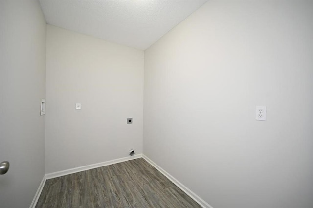 12905 Ridgeview Dr, Platte City, MO 64079 - laundry room featuring electric dryer hookup and dark wood-style flooring