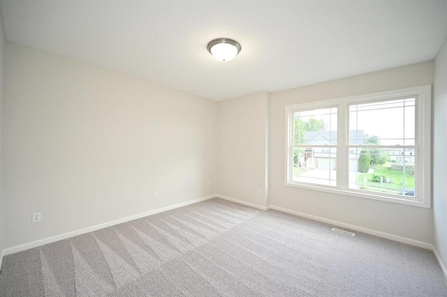 12905 Ridgeview Dr, Platte City, MO 64079 - carpeted empty room with baseboards