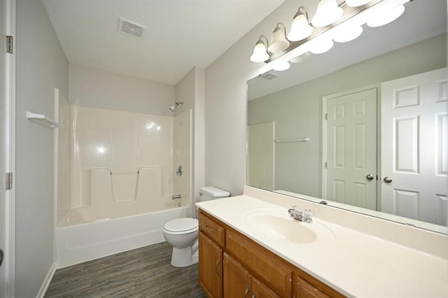 12905 Ridgeview Dr, Platte City, MO 64079 - bathroom with wood finished floors, vanity, and shower / bathtub combination