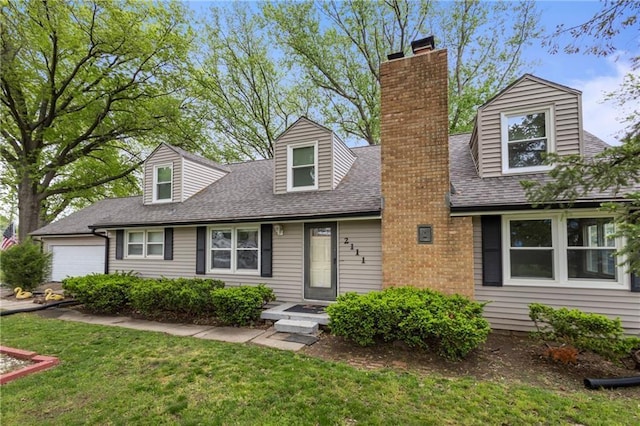 2111 Lombardy Dr, Kansas City, KS 66102 - new england style home with a front yard, a shingled roof, and a chimney