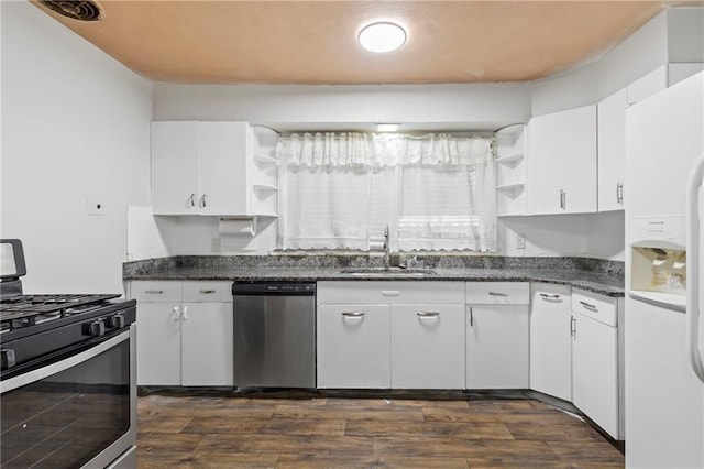 2111 Lombardy Dr, Kansas City, KS 66102 - kitchen with stainless steel appliances, open shelves, dark wood finished floors, and white cabinetry