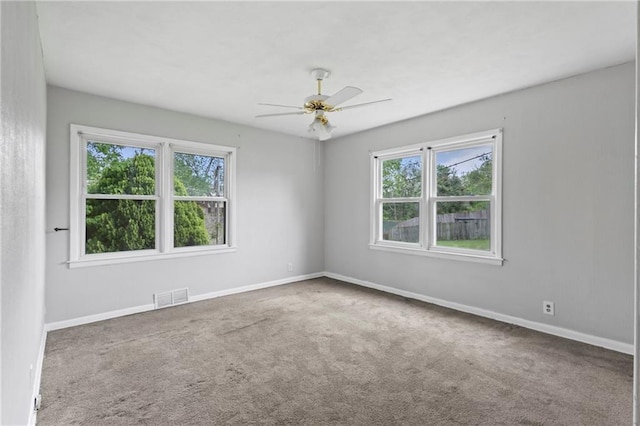 2111 Lombardy Dr, Kansas City, KS 66102 - empty room featuring a ceiling fan and carpet
