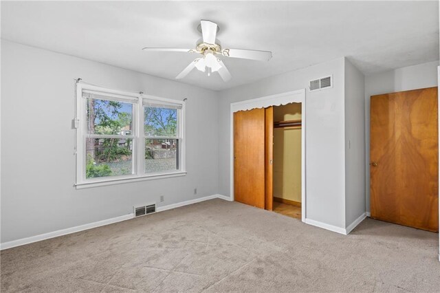 2111 Lombardy Dr, Kansas City, KS 66102 - unfurnished bedroom with carpet floors, ceiling fan, and a closet