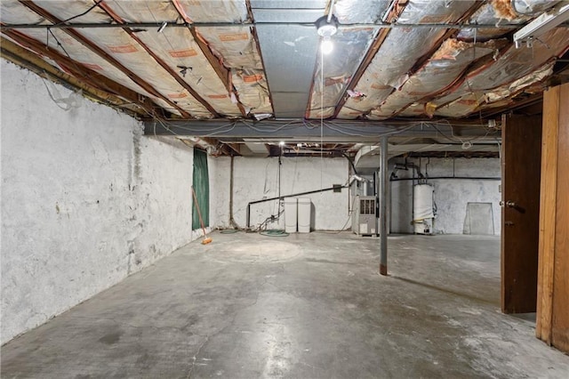 2111 Lombardy Dr, Kansas City, KS 66102 - unfinished below grade area featuring gas water heater and heating unit